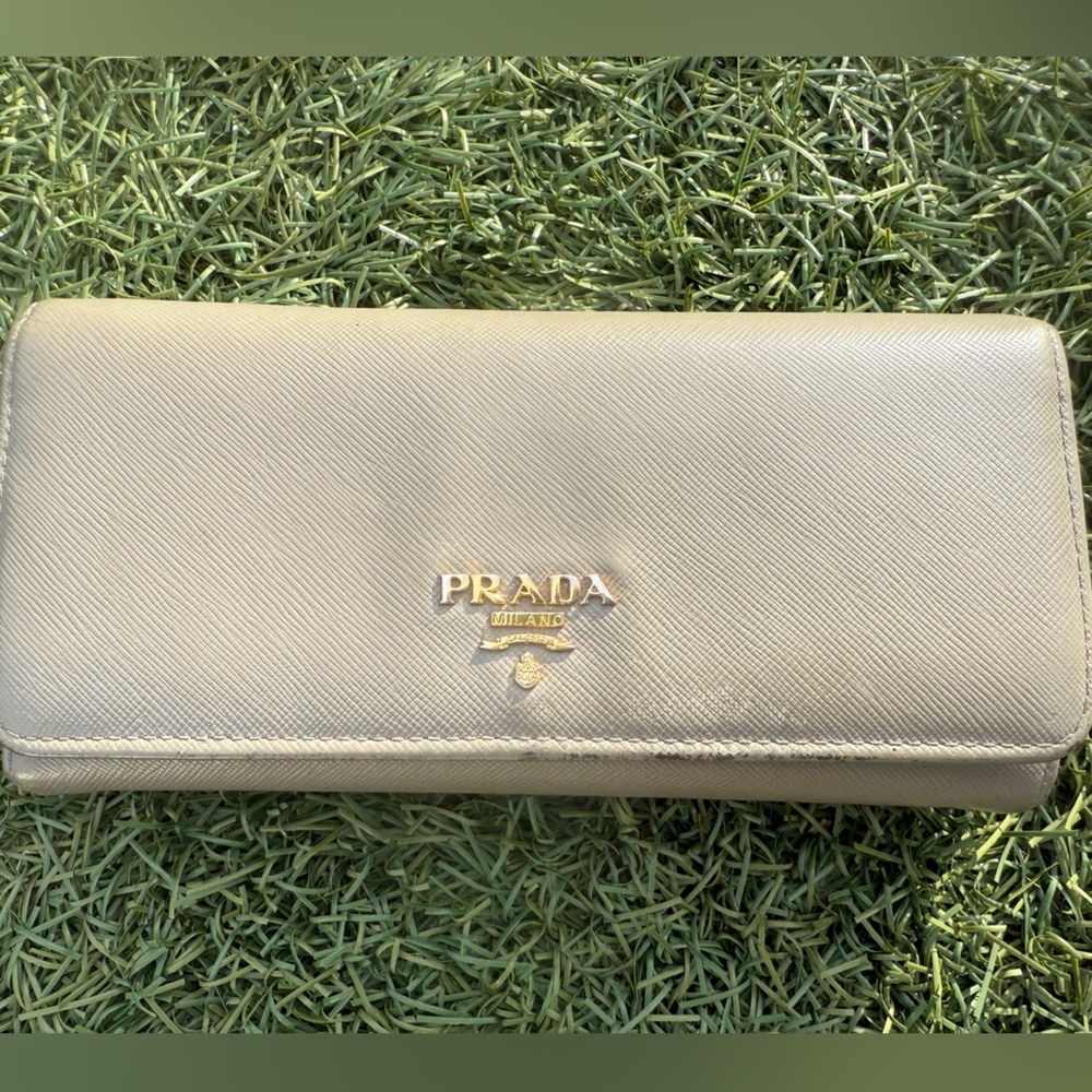 Make an offer!! Authentic Prada Beige Saffiano Leather Wallet with Gold Logo